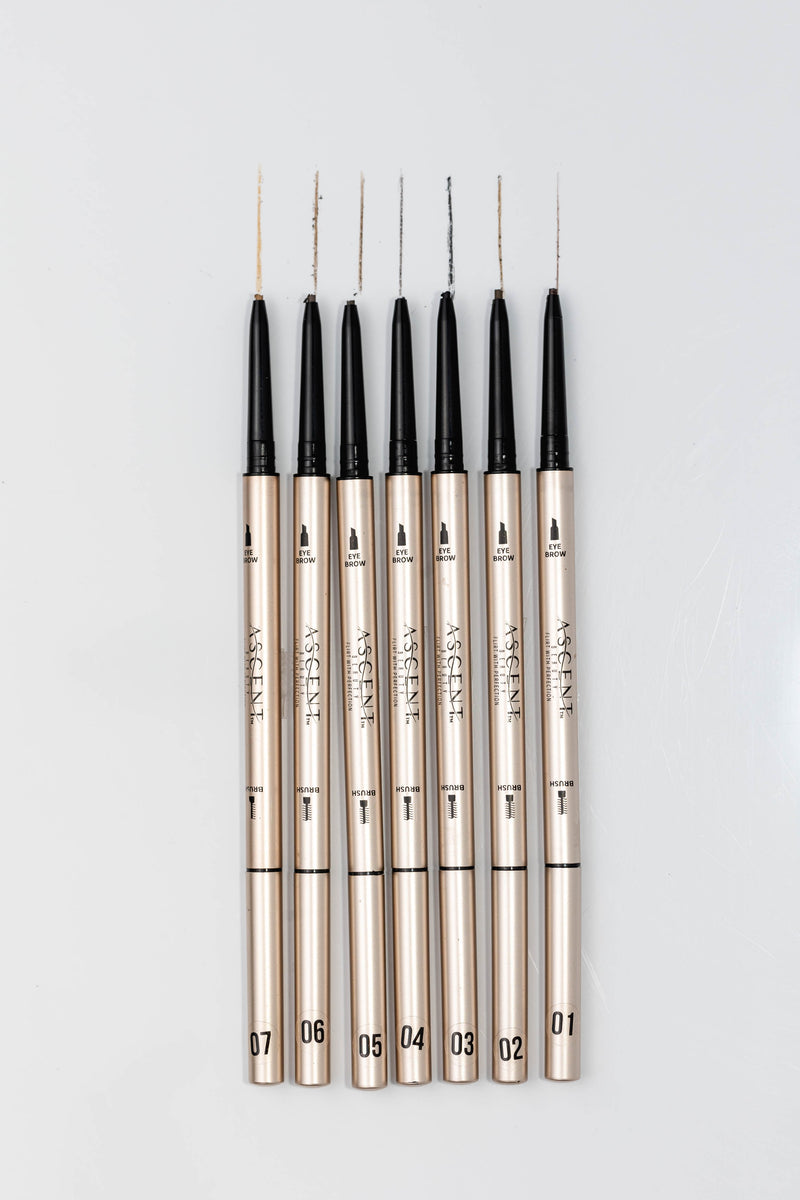 row of brow pencils with swatches